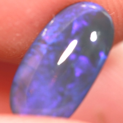 SOLID BLACK CRYSTAL OPAL Lots of purple fire always